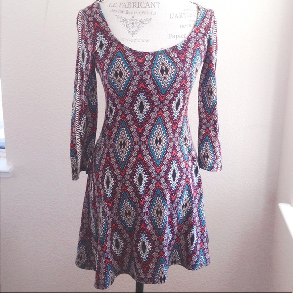 Boutique Dresses & Skirts - NWOT "Lucy in the Sky" patterned knit dress